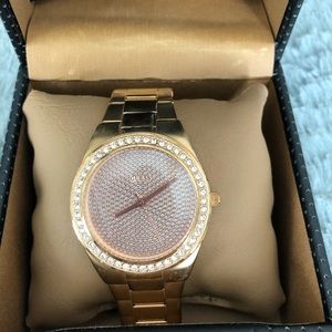 Women’s guess gold watch